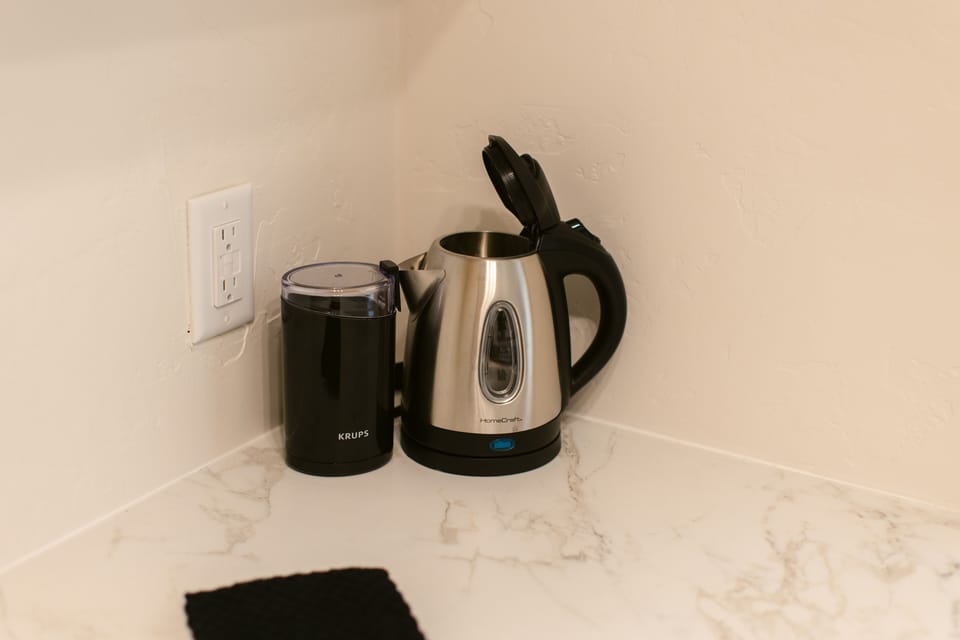 Enjoy a refreshing selection of black and green tea, thoughtfully provided for your stay!