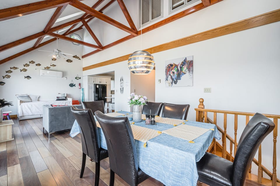 The dining area is perfect for family meals and gatherings, with its elegant decor and inviting atmosphere.