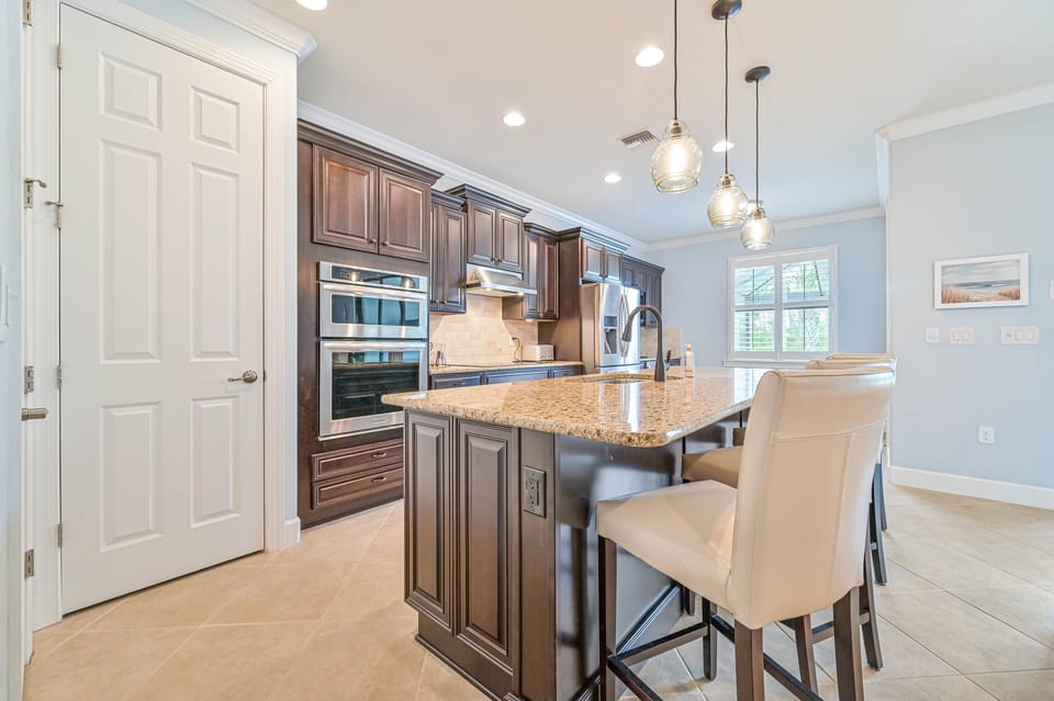 Villa Paradise at The Preserve - Fully equipped kitchen with island and bar area with beverage center