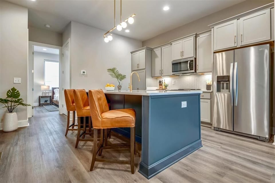 Open Concept Chef's Kitchen | Island Seating | Stainless Appliances | Second Floor
