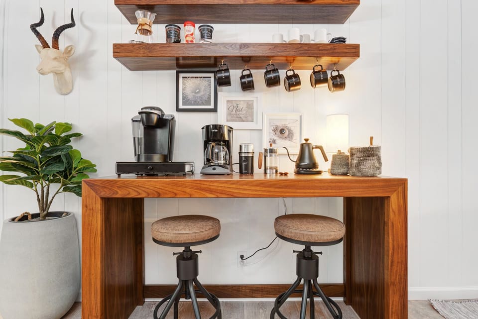 Fully stocked coffeebar complete with a Keurig, drip, French press, or pourover for your favorite cu