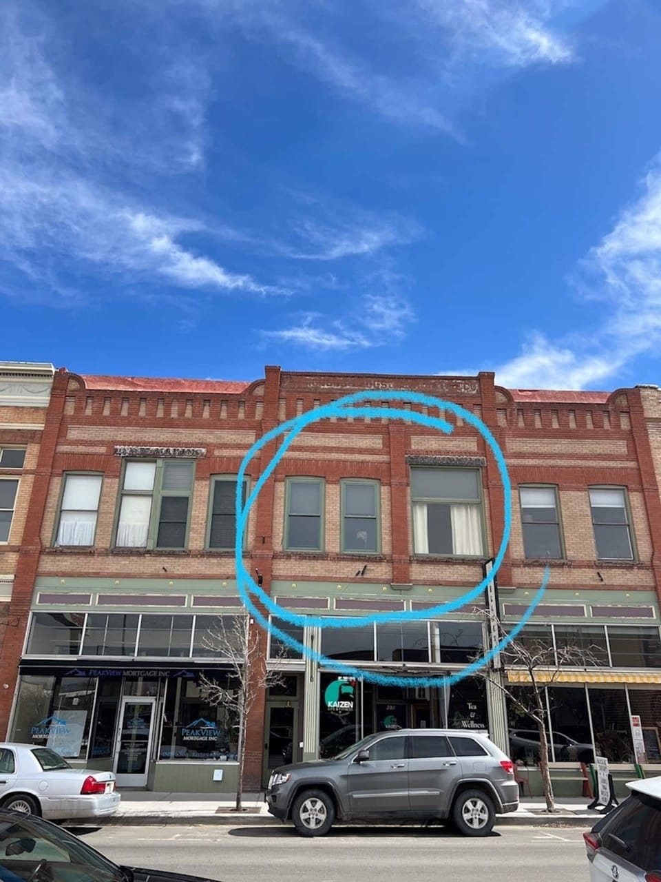 Building facade showing windows overlooking F Street, Downtown Salida