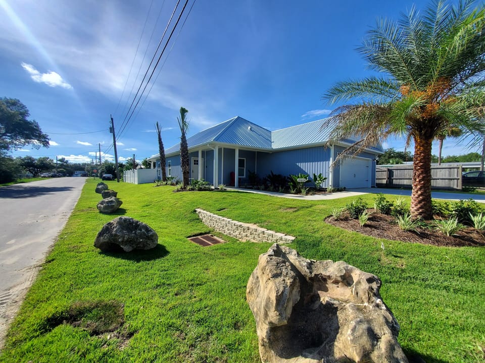 Beautiful Palms, Coral, and Tropical Plants decorate this tropical paradise! 