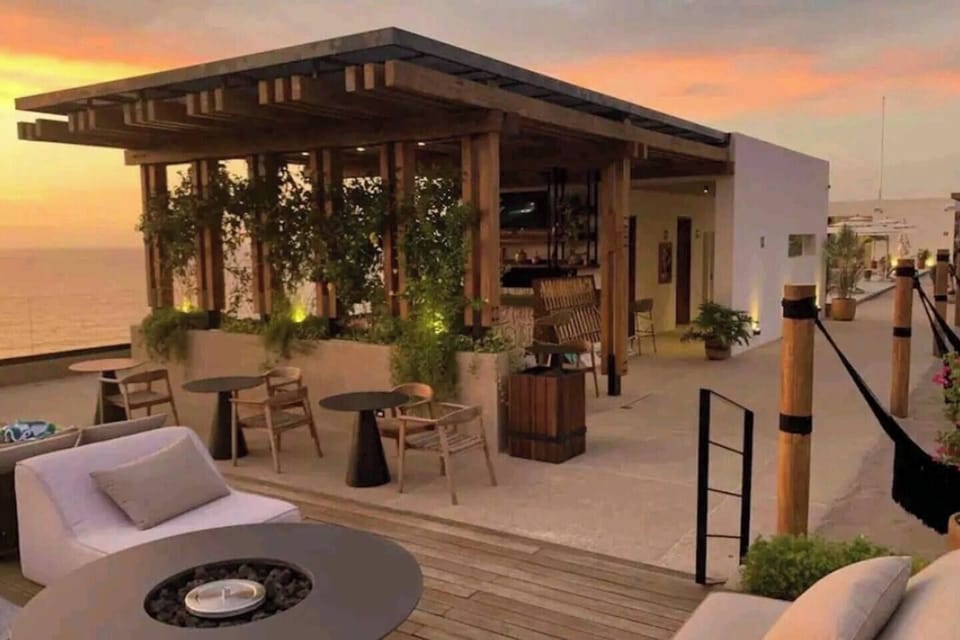Chat with the friendly staff at the bar while sipping your cocktail! 