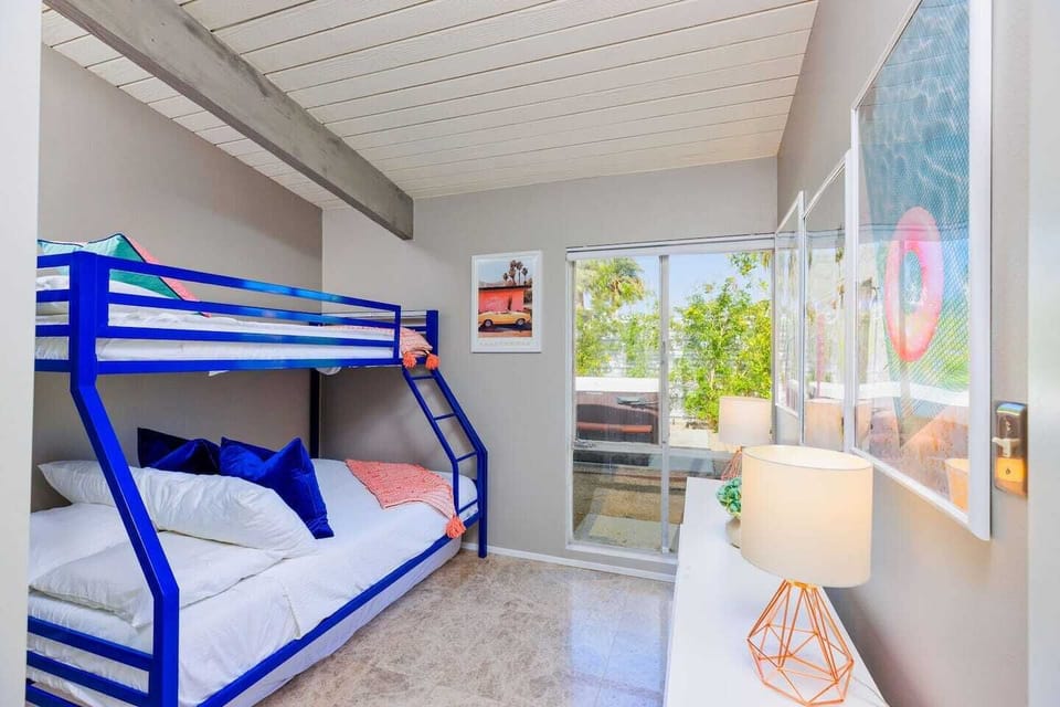 Guest bedroom #3 has a queen bed and a single bed.