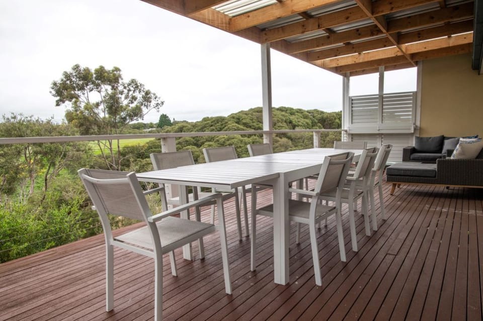 Outdoor dining area looking over reserve
