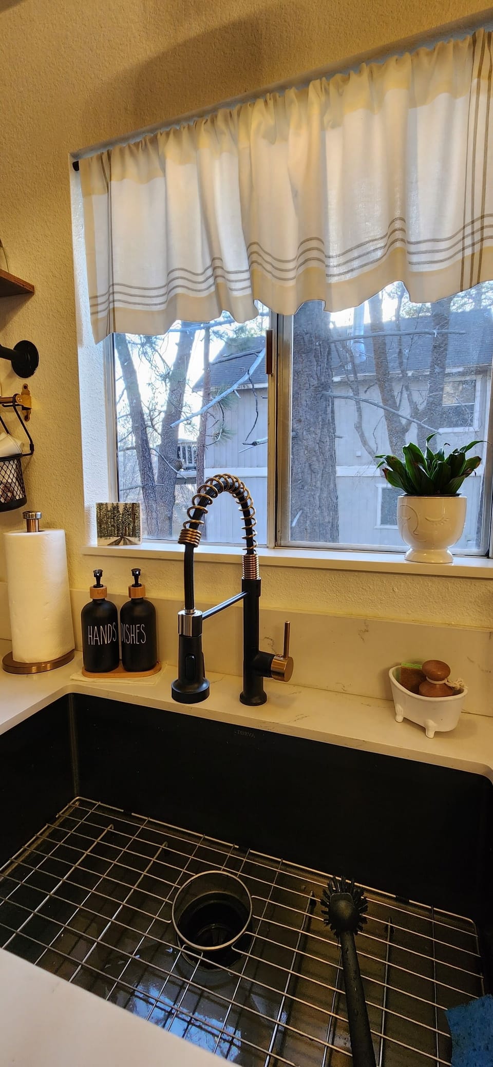 Large sink/with Essentials for the kitchen in cabinet below