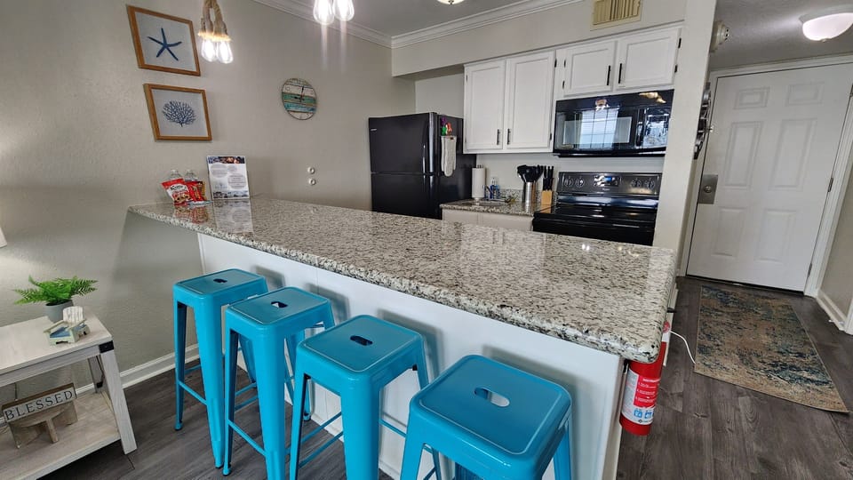 Bar seating in kitchen.