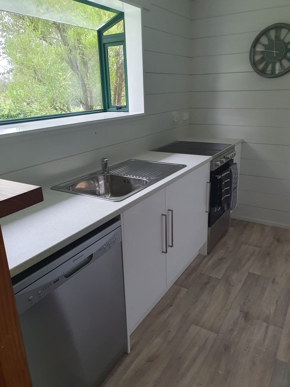 Renovated kitchen with full size appliances. Dishwasher, Fridge Freezer and Oven