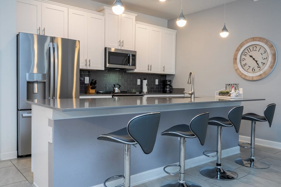 Fall in love for modern luxury with our stunning open kitchen—a beautiful, vibrant space that seamlessly combines style and functionality. a family-friendly retreat where the joy of cooking meets the warmth of togetherness.