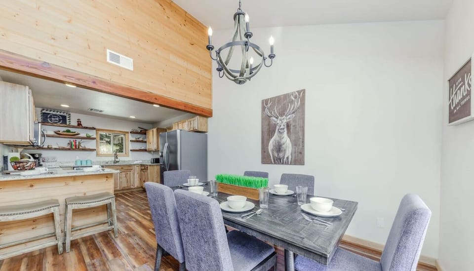 Spacious dining room for 6, conveniently located near the kitchen.