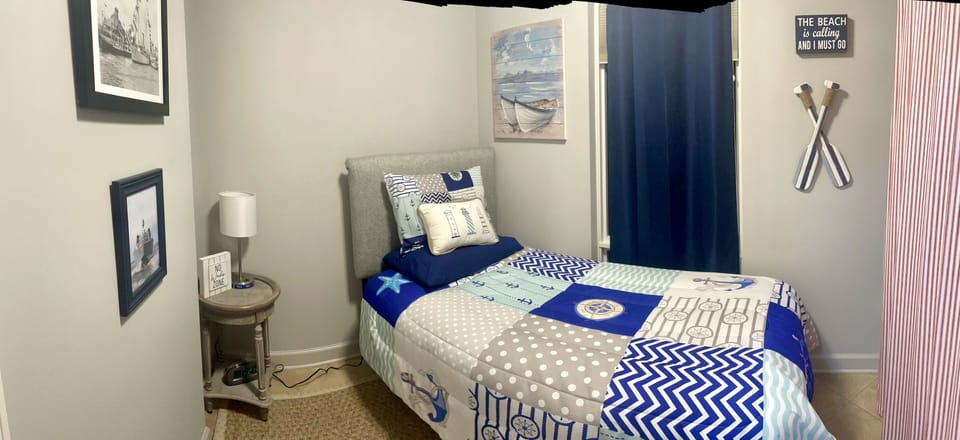 Kid's room/laundry room - this is an extra bed