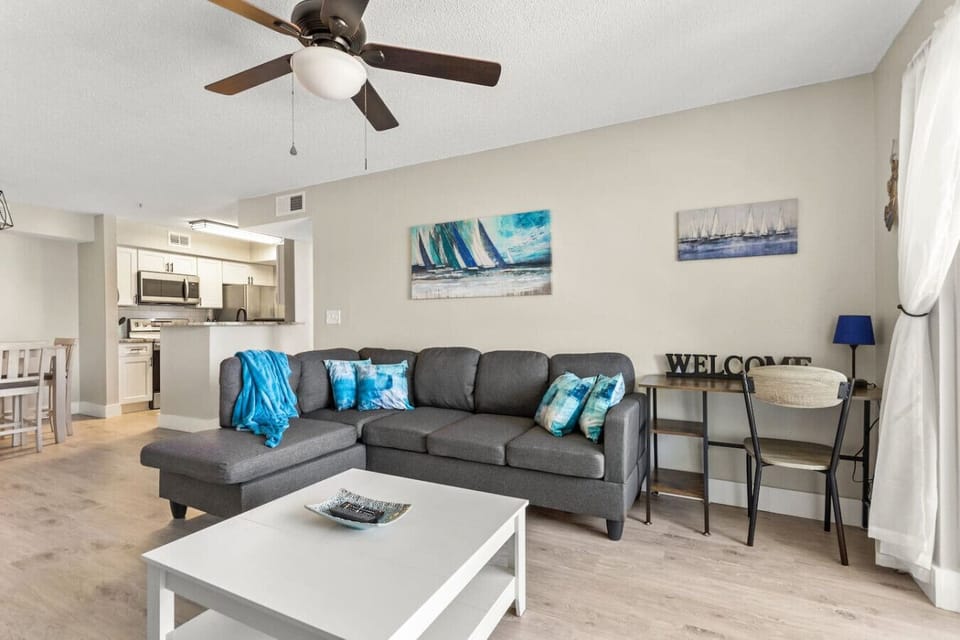 Bright, open, and welcoming! Enjoy the airy feel and lively colors of this spacious living area.