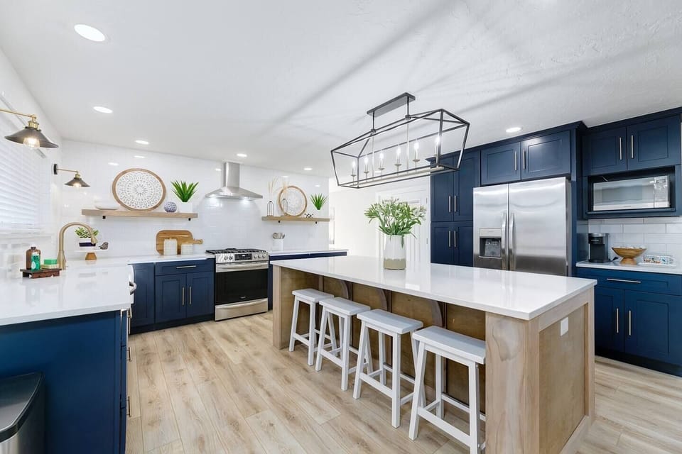 Custom kitchen island seats 8, perfect for family games and puzzles. 