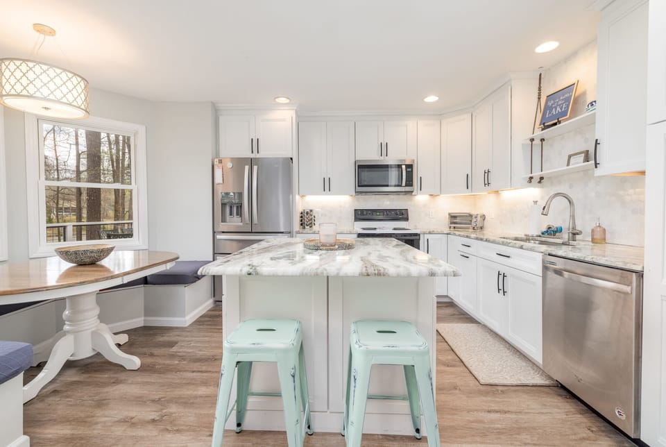 Fully stocked kitchen with ample counter space and updated appliances.