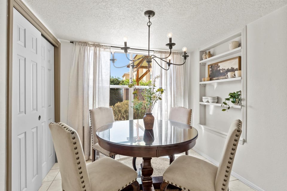 Kitchen nook and pantry for extra storage- and great backyard views!