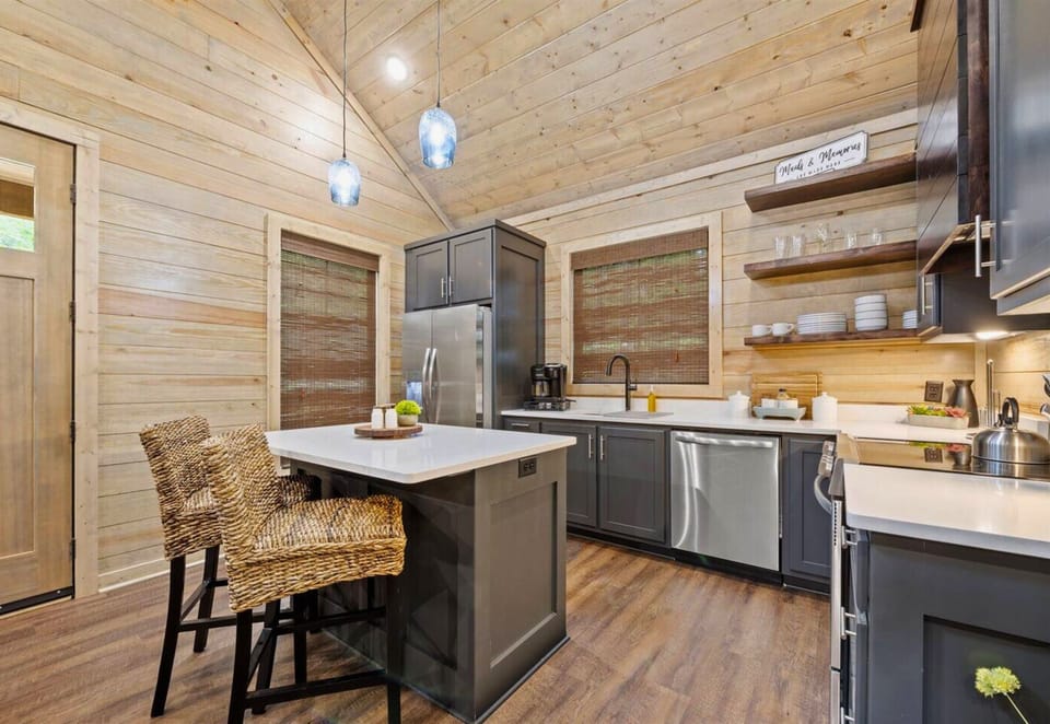 Culinary delights await! Our cabin's fully equipped kitchen is ready for your family feasts or a romantic dinner for two.