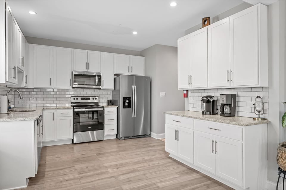Large kitchen fully equipped with what you'll need during your stay!