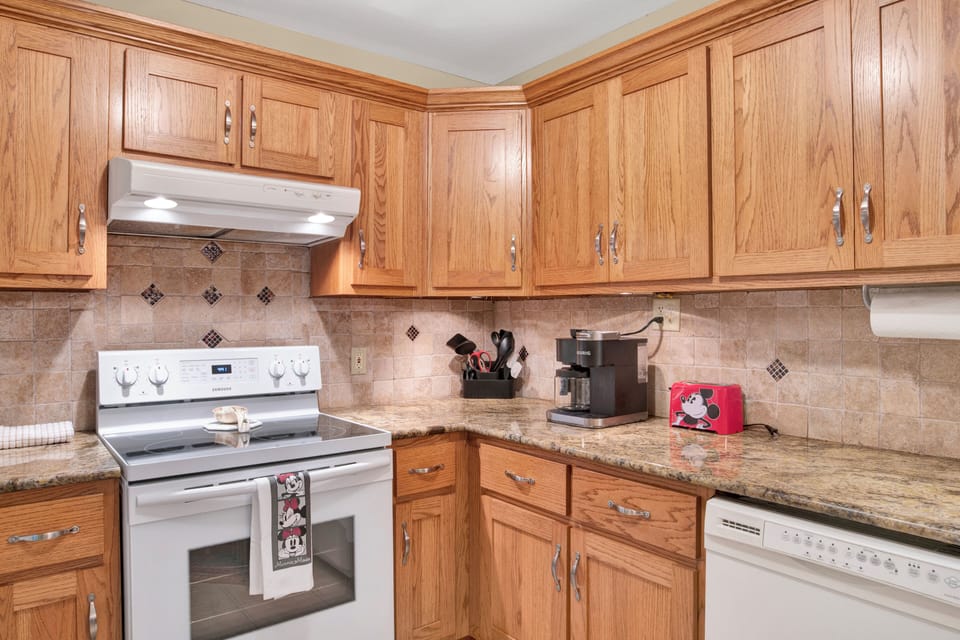 Fully stocked kitchen. Mickey mouse toaster.
