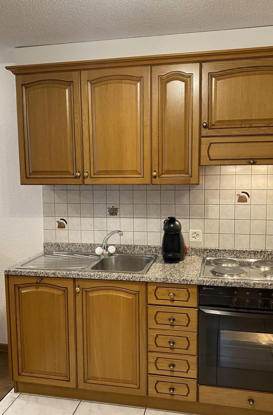 Cabinetry, Countertop, Property, Furniture, White, Kitchen, Tap, Building, Drawer, Wood