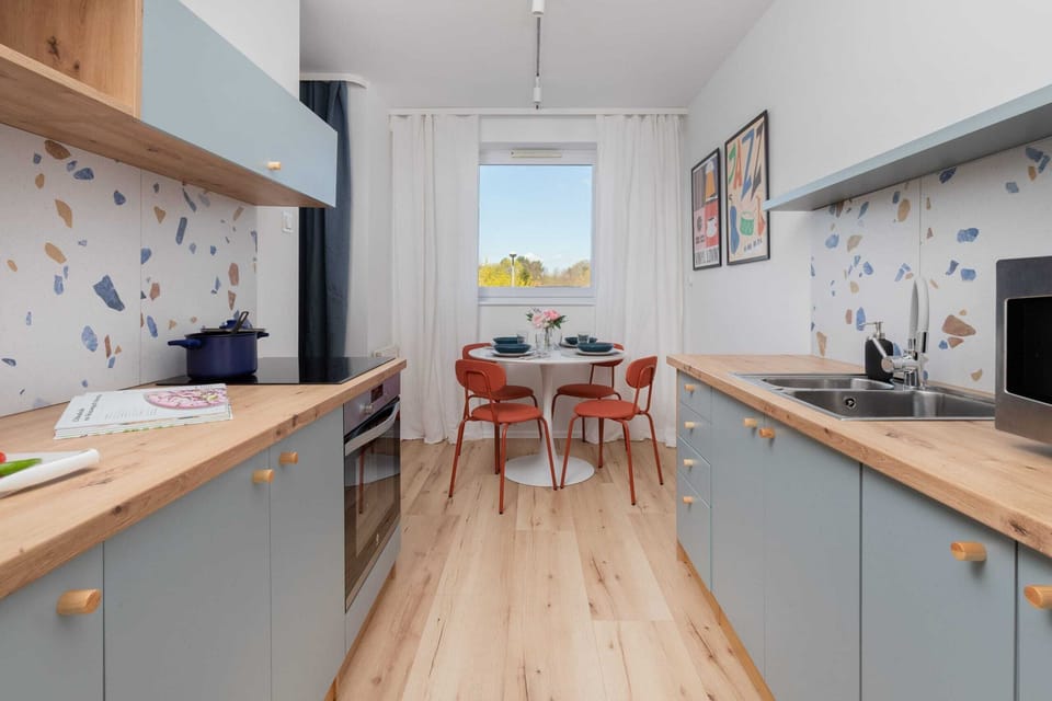 Cook and dine in style with the modern kitchenette and dining area.