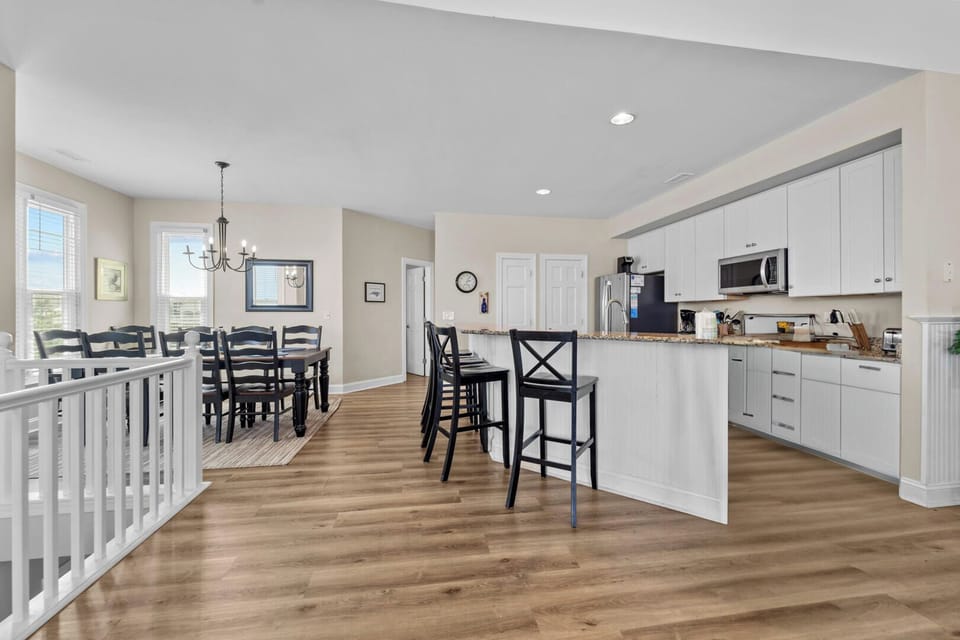 Kitchen with Bar Seating on Third Level