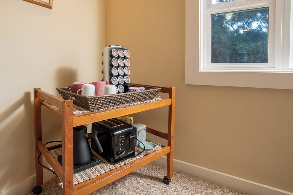 A simple coffee station by the window keeps mornings easy