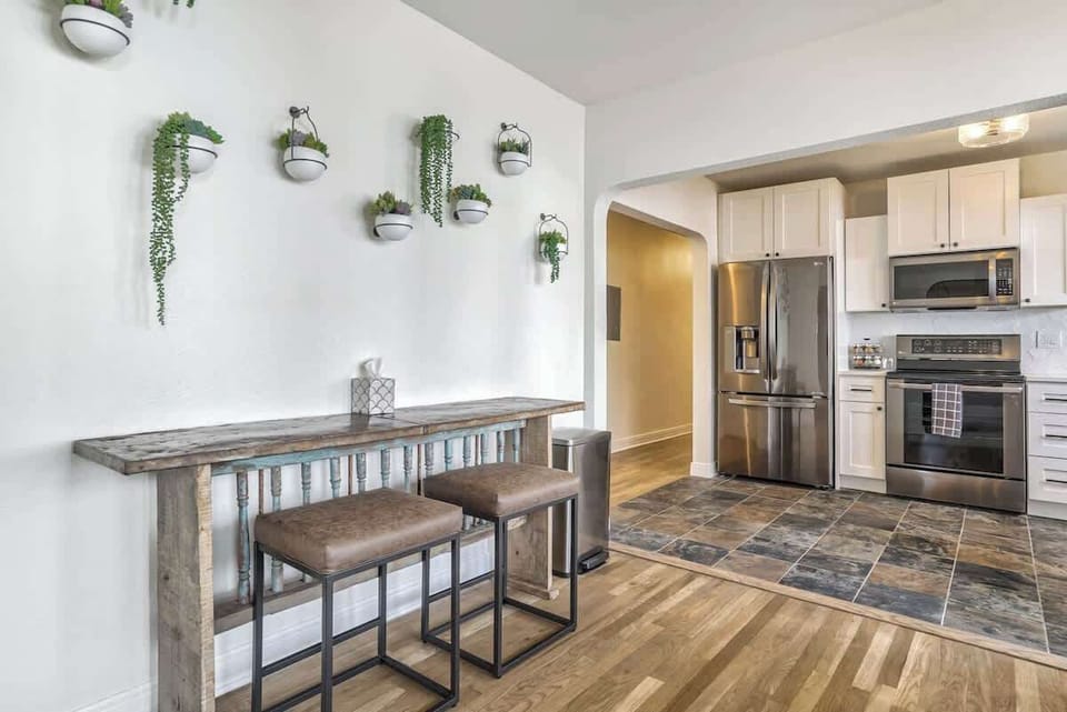 Unit A: Circle around for home-cooked food or delicious takeout around table with plenty of open light flowing in!