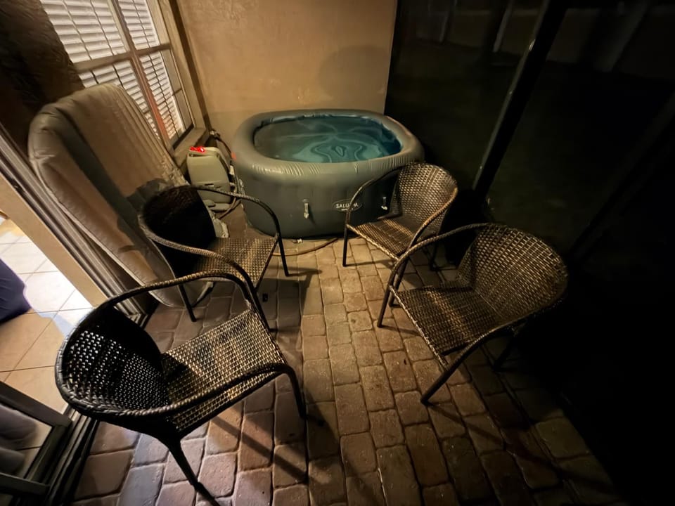 Patio with hot tub