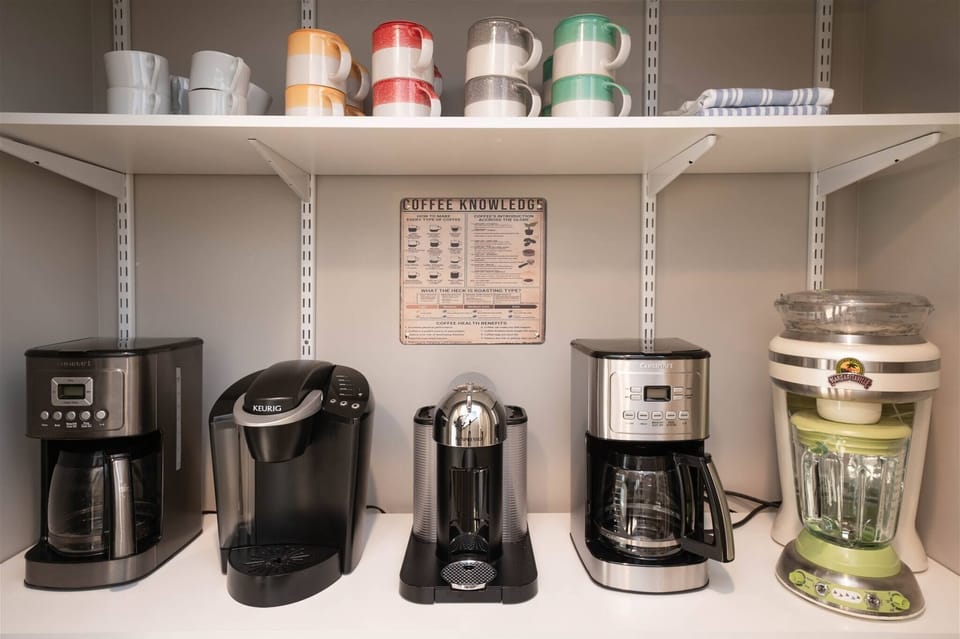 Start your mornings right at this fully stocked coffee station featuring multiple brew options.