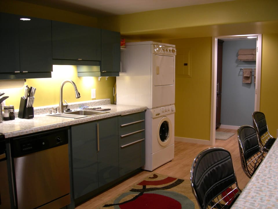 Lots of under-cabinet lighting! Bathroom door is in the background.
