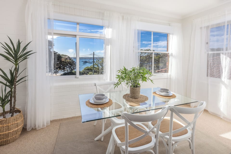 Awash with natural light and beach and water views.