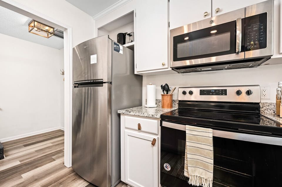 Your culinary playground: a blender, toaster, microwave, and kettle await your touch, and stainless steel appliances to prepare 5-star meals with ease.