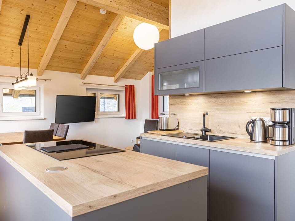 Cabinetry, Property, Countertop, Kitchen Sink, Sink, Kitchen Stove, Kitchen Appliance, Home Appliance, Wood, Kitchen