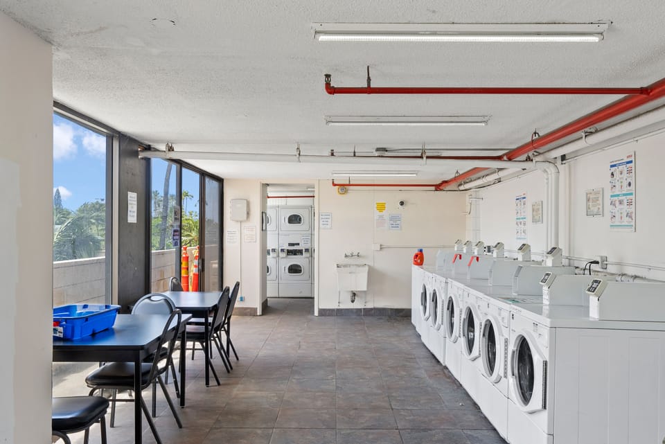 Shared laundry area with paid washer and dryer