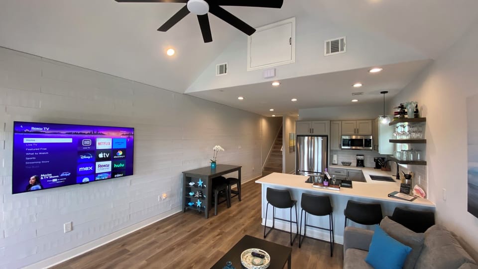 65” Roku TV—stream your favorite shows.