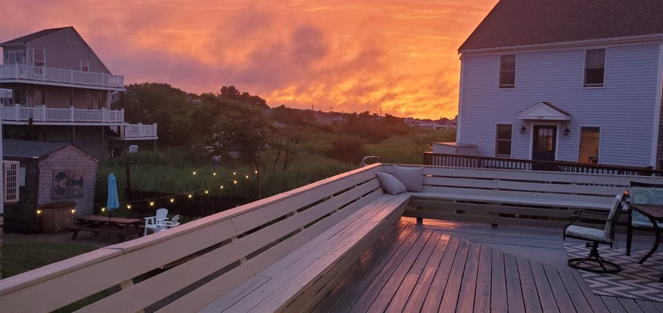 sunset out the back end of deck