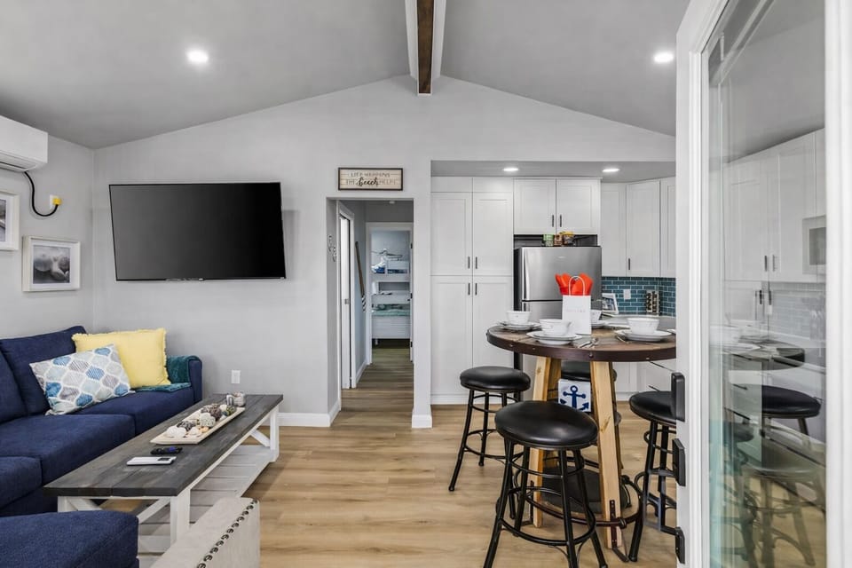 Living Room: Bright space with fun decor, perfect for relaxing or game nights!