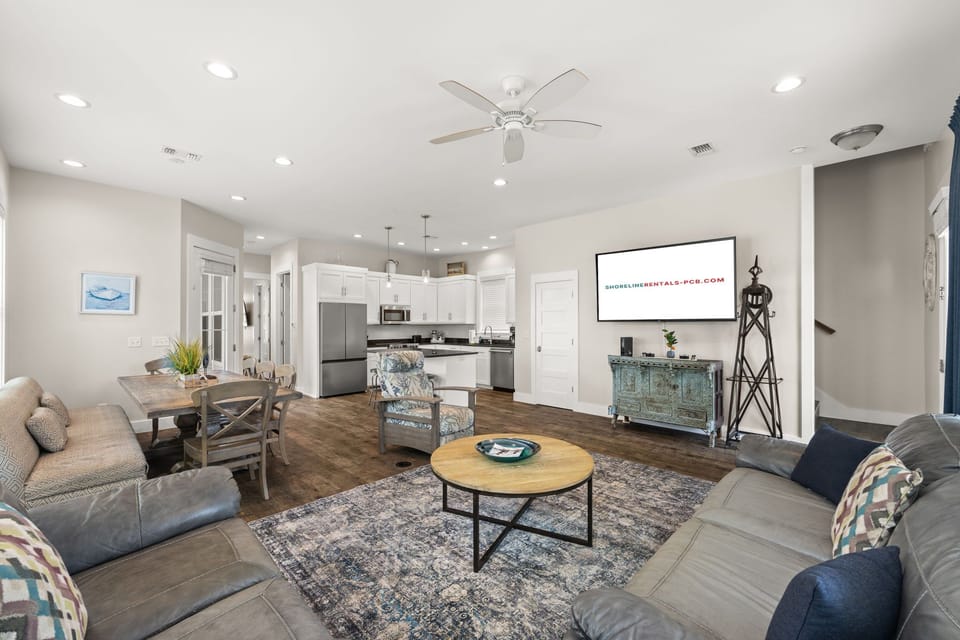 Open concept living area designed for family vacations, movie nights & relaxing after the beach