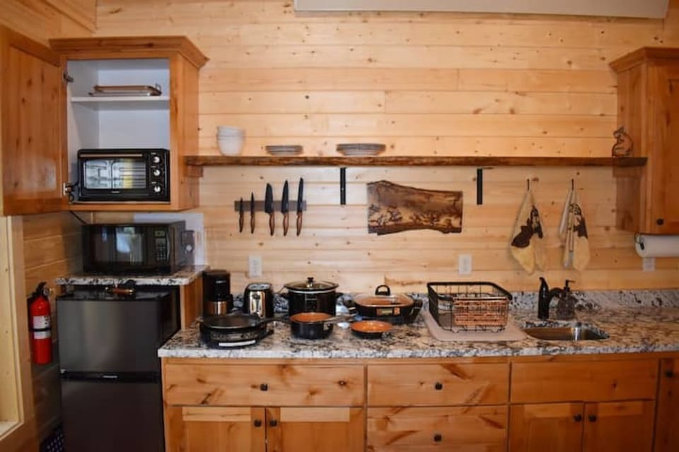 small toaster oven, microwave and fridge