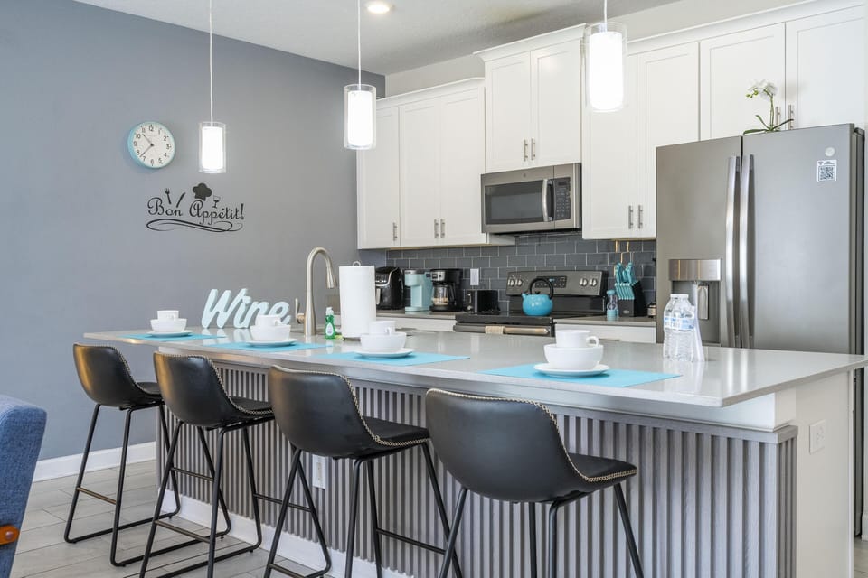 Modern kitchen with sleek island seating for gatherings
