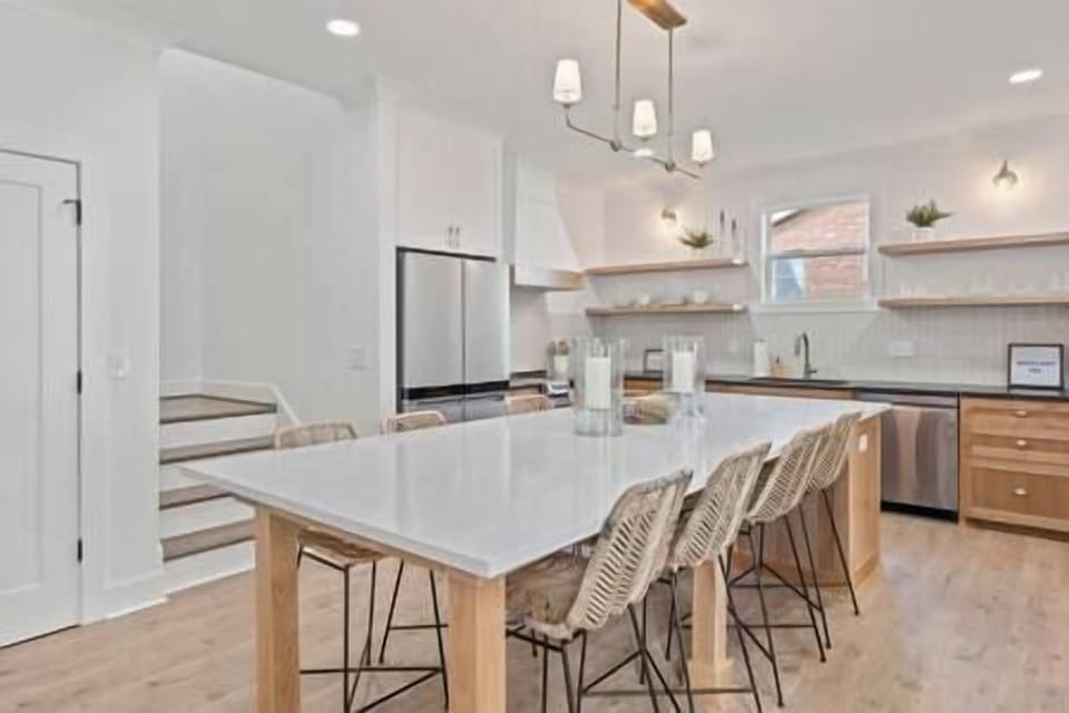 fully equipped and stocked kitchen. Washer/dryer is located in kitchen as well next to pantry