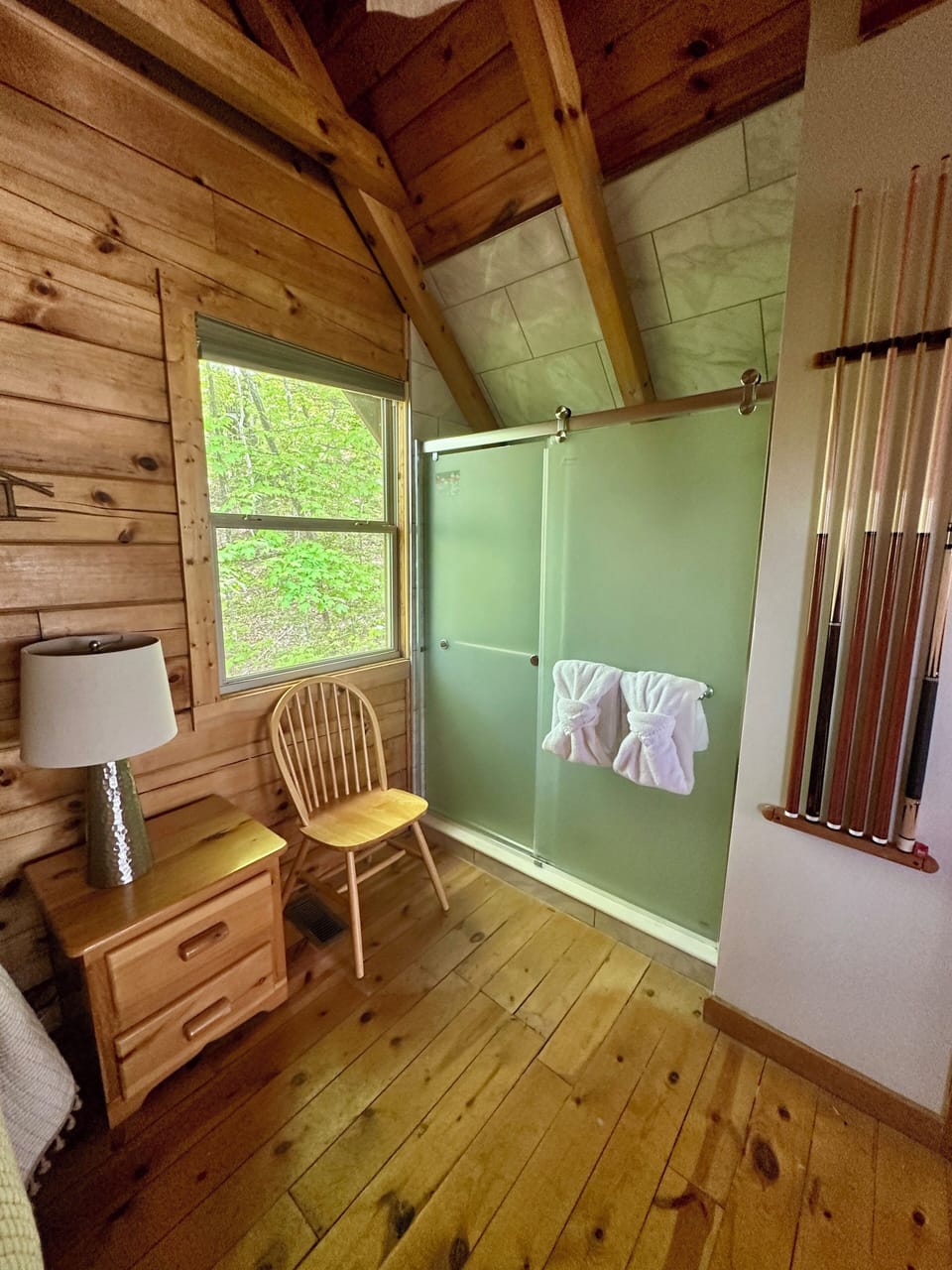 loft area shower with privacy glass