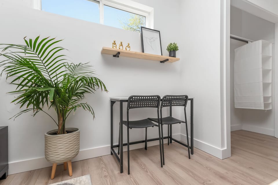 Work space, pull from wall to use as dining table for two