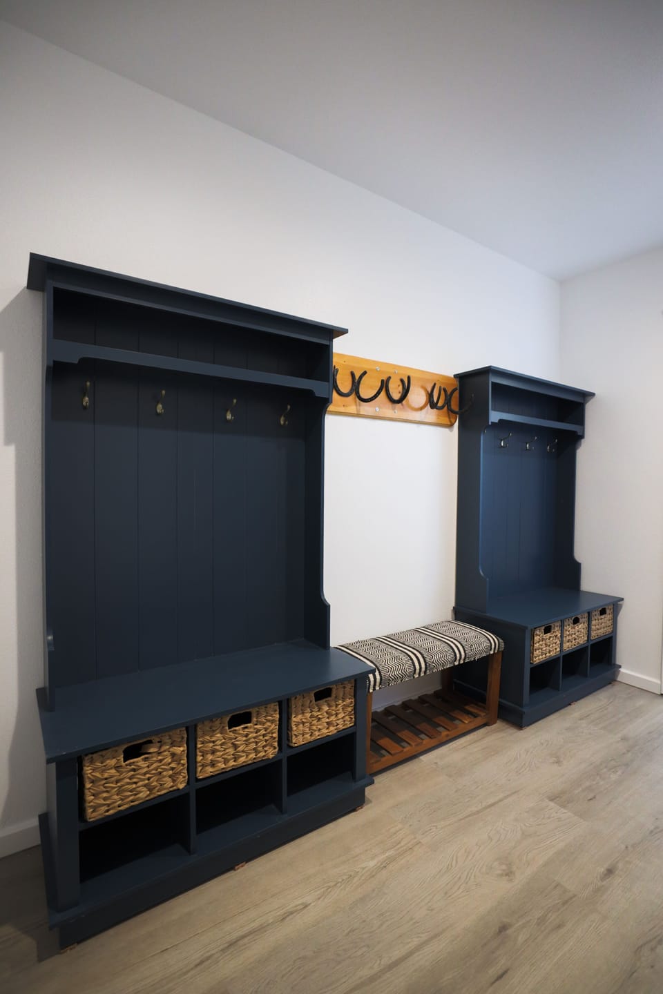 Store your shoes and hang up your coats in the cozy entryway area.