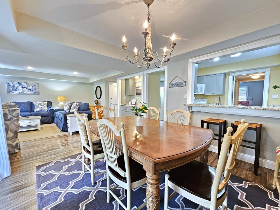 Dining Room and Kitchen with Breakfast Bar at 15 Fazio