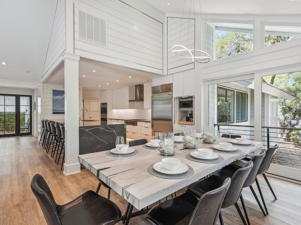 Gather-ready dining and kitchen connection for the whole group.