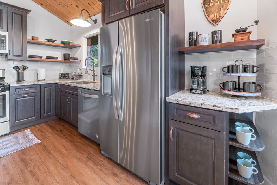Full size refrigerator with a water dispenser and coffee bar 