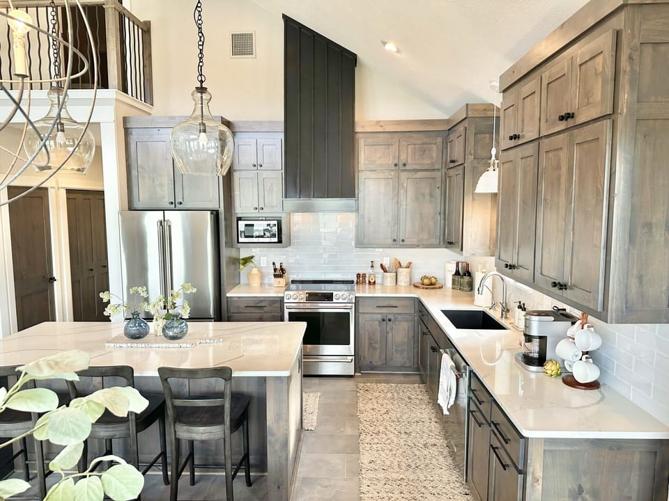 Gourmet kitchen equipped with GE Café appliances 