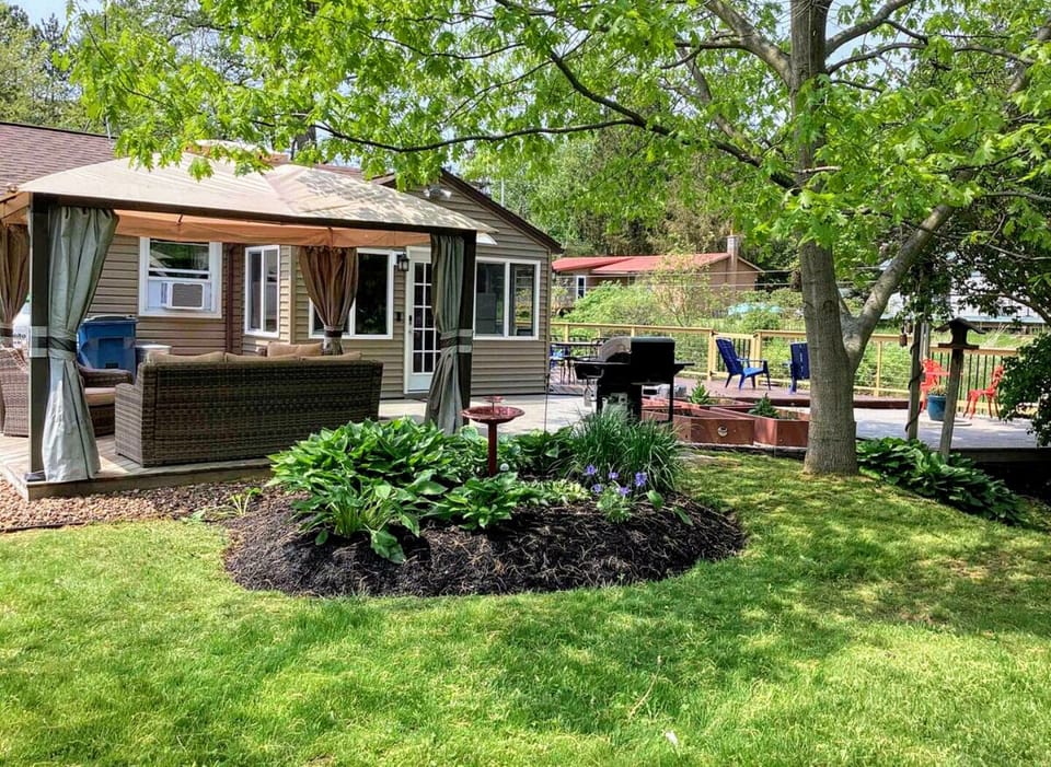 View from the side yard looking at the gazebo & patio area by the Inlet.